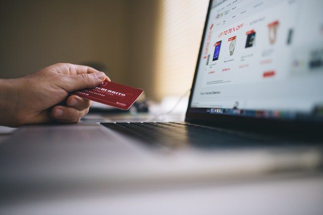 a person making a purchase on an online store