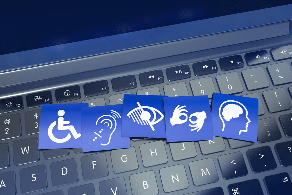 Multiple accessibility symbol cut outs on a keyboard